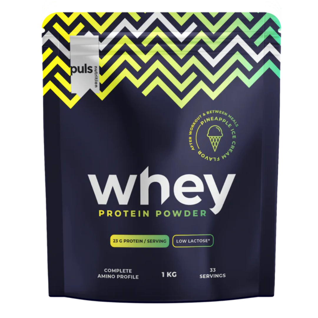 Korkealaatuinen Puls Nutrition Whey -heraproteiinijauhe, jonka makuna on ananasjäätelö.