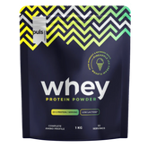 Korkealaatuinen Puls Nutrition Whey -heraproteiinijauhe, jonka makuna on ananasjäätelö.